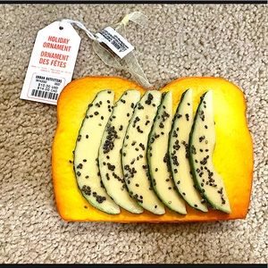 Urban Outfitters avocado toast ornament NWT.